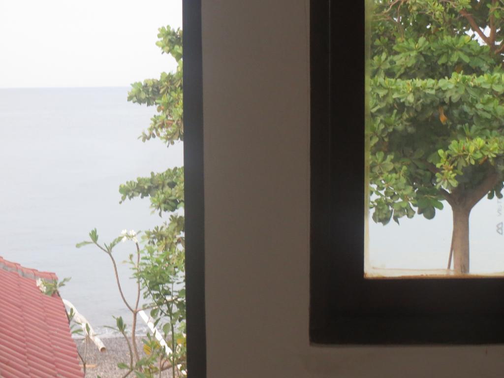 Amed Sari Beach Guesthouse ภายนอก รูปภาพ