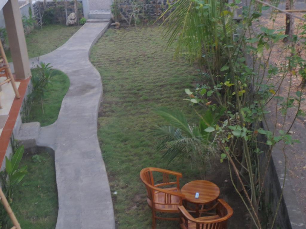 Amed Sari Beach Guesthouse ภายนอก รูปภาพ