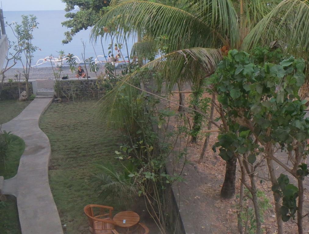 Amed Sari Beach Guesthouse ภายนอก รูปภาพ