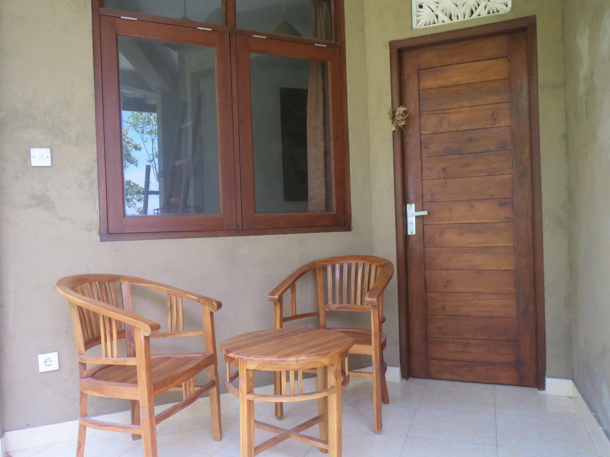 Amed Sari Beach Guesthouse ภายนอก รูปภาพ