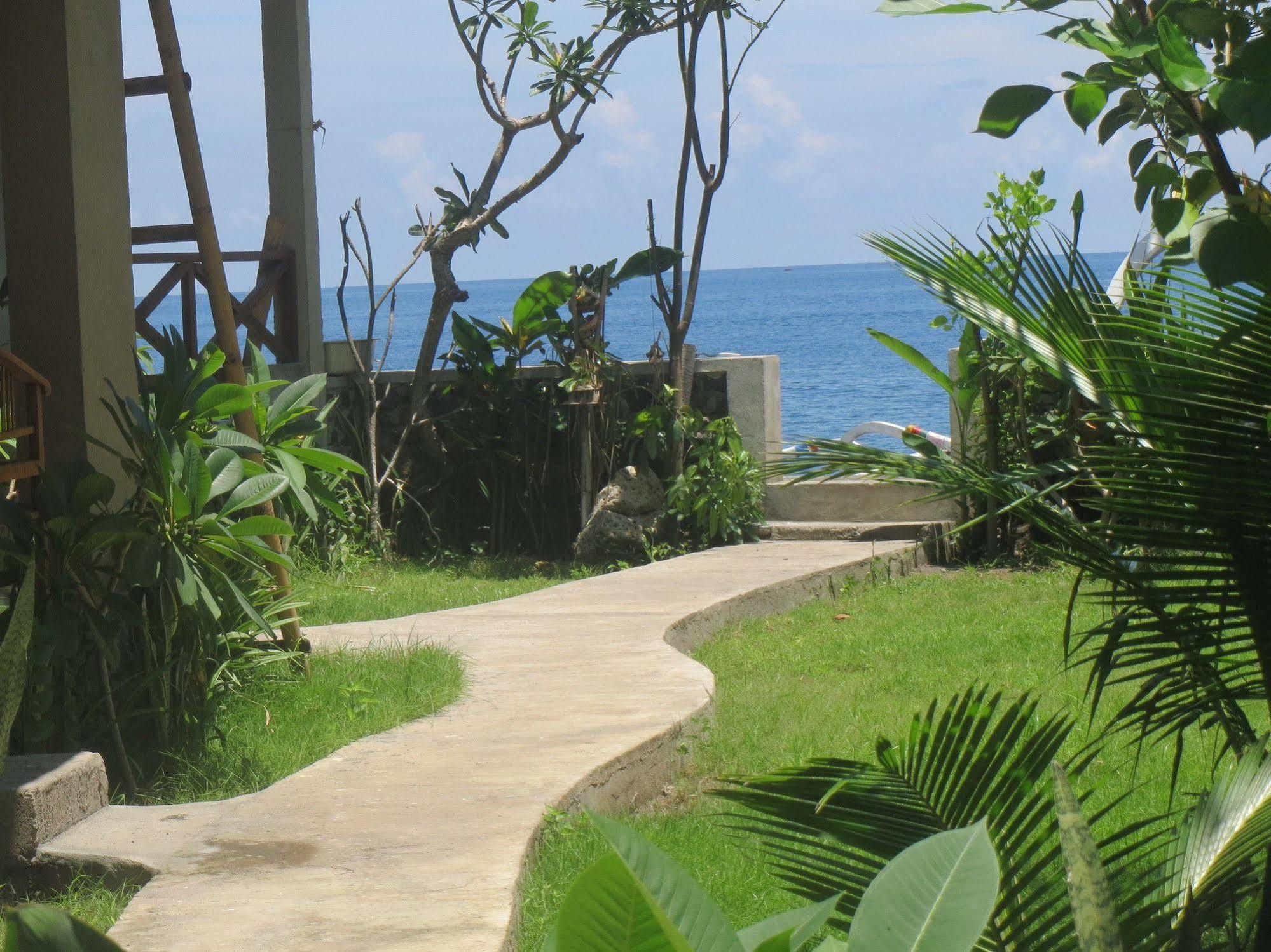 Amed Sari Beach Guesthouse ภายนอก รูปภาพ