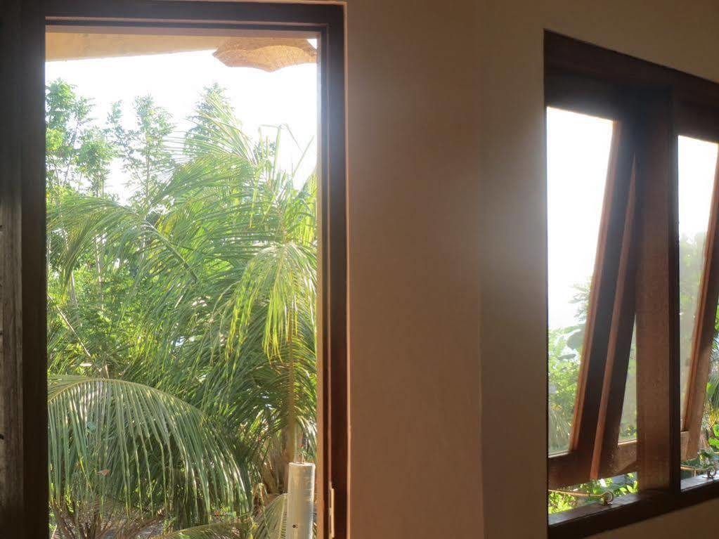 Amed Sari Beach Guesthouse ภายนอก รูปภาพ