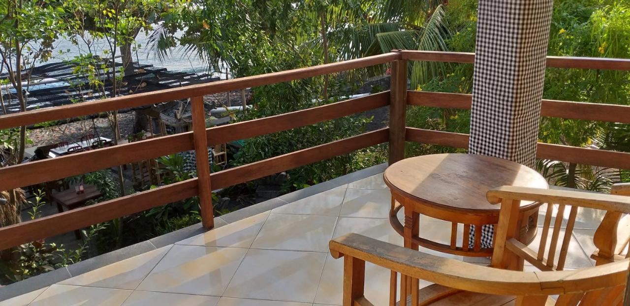Amed Sari Beach Guesthouse ภายนอก รูปภาพ