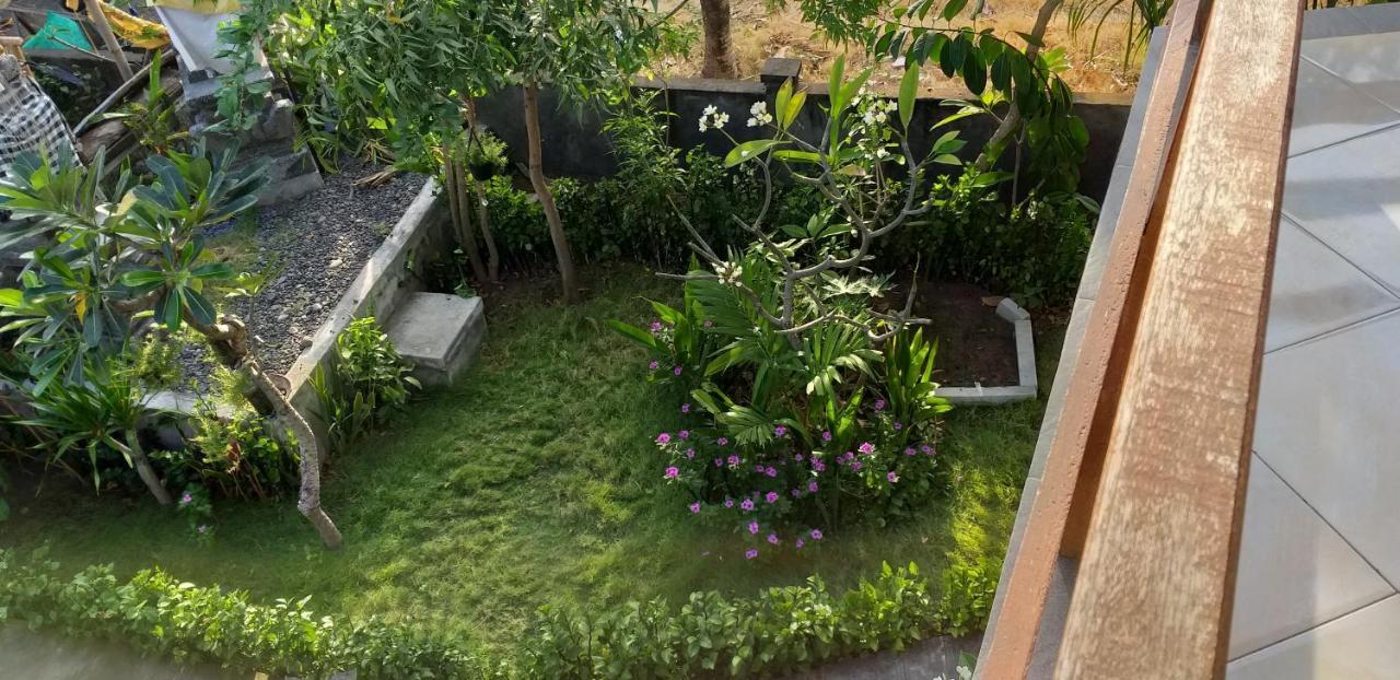 Amed Sari Beach Guesthouse ภายนอก รูปภาพ