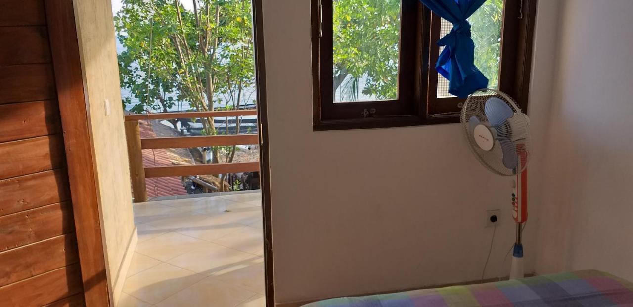 Amed Sari Beach Guesthouse ภายนอก รูปภาพ